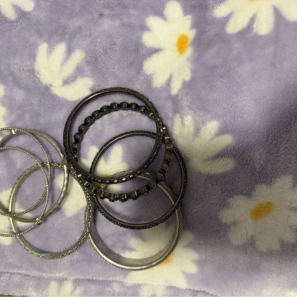 Stylish Silver and Black Bangle Set
You get all for one low price - Picture 10 of 12